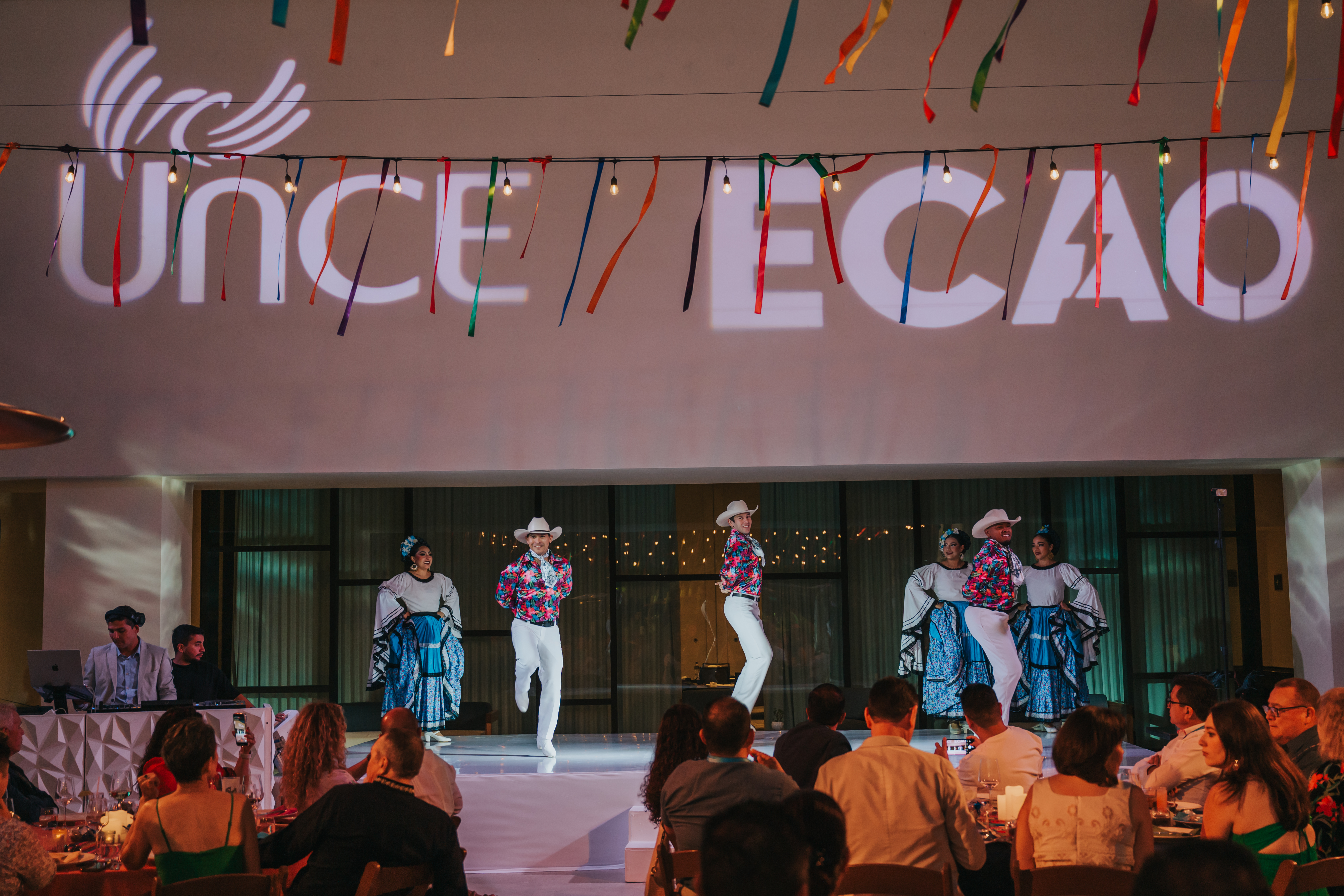 <a class='button-link' download href='https://www.ecao.org/wp-content/uploads/2026/06/ECAO-UNCE-Farewell-Evening-Cabo-05.03.26-JJStudio-103.jpg'>Download</a>
