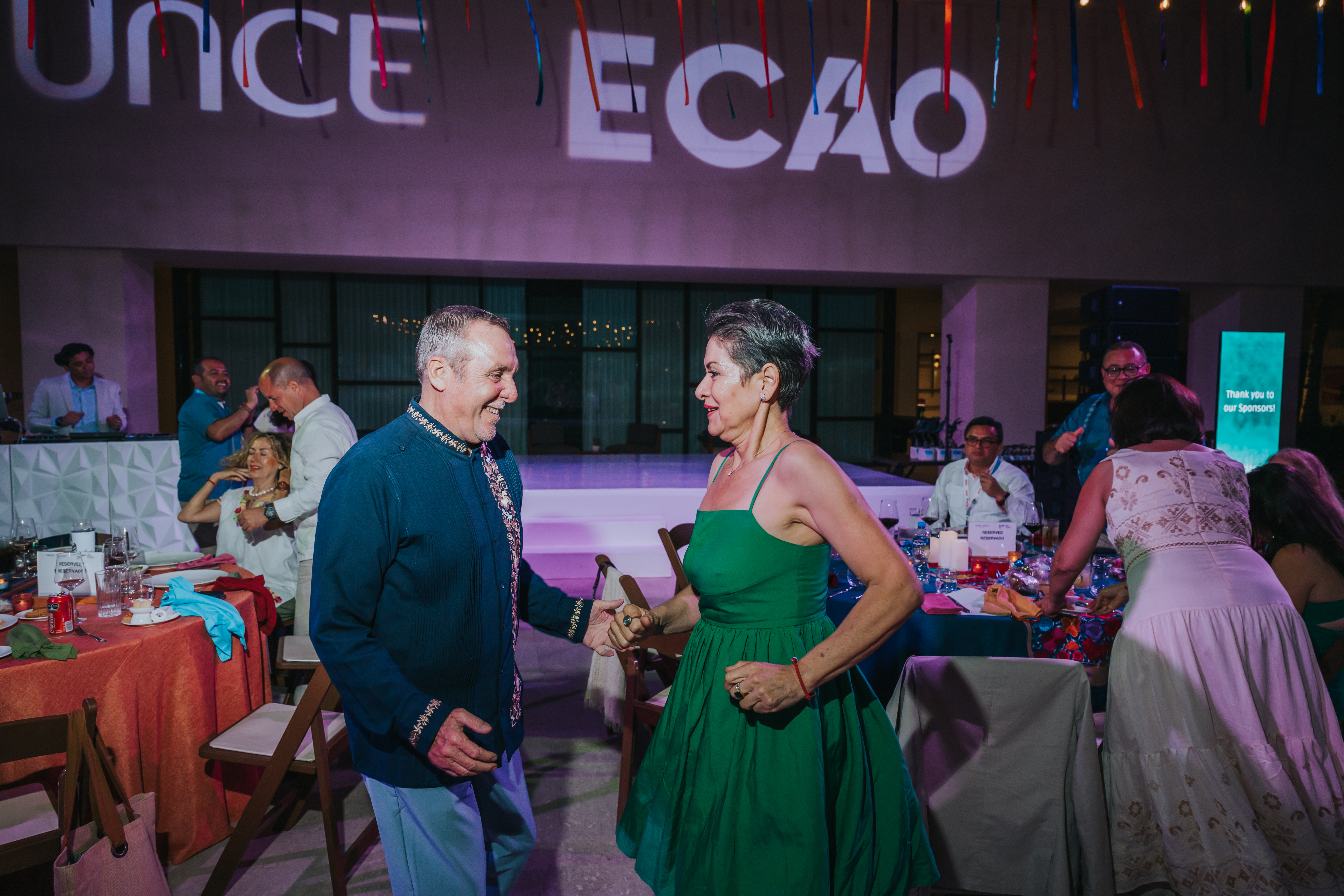 <a class='button-link' download href='https://www.ecao.org/wp-content/uploads/2026/06/ECAO-UNCE-Farewell-Evening-Cabo-05.03.26-JJStudio-178.jpg'>Download</a>