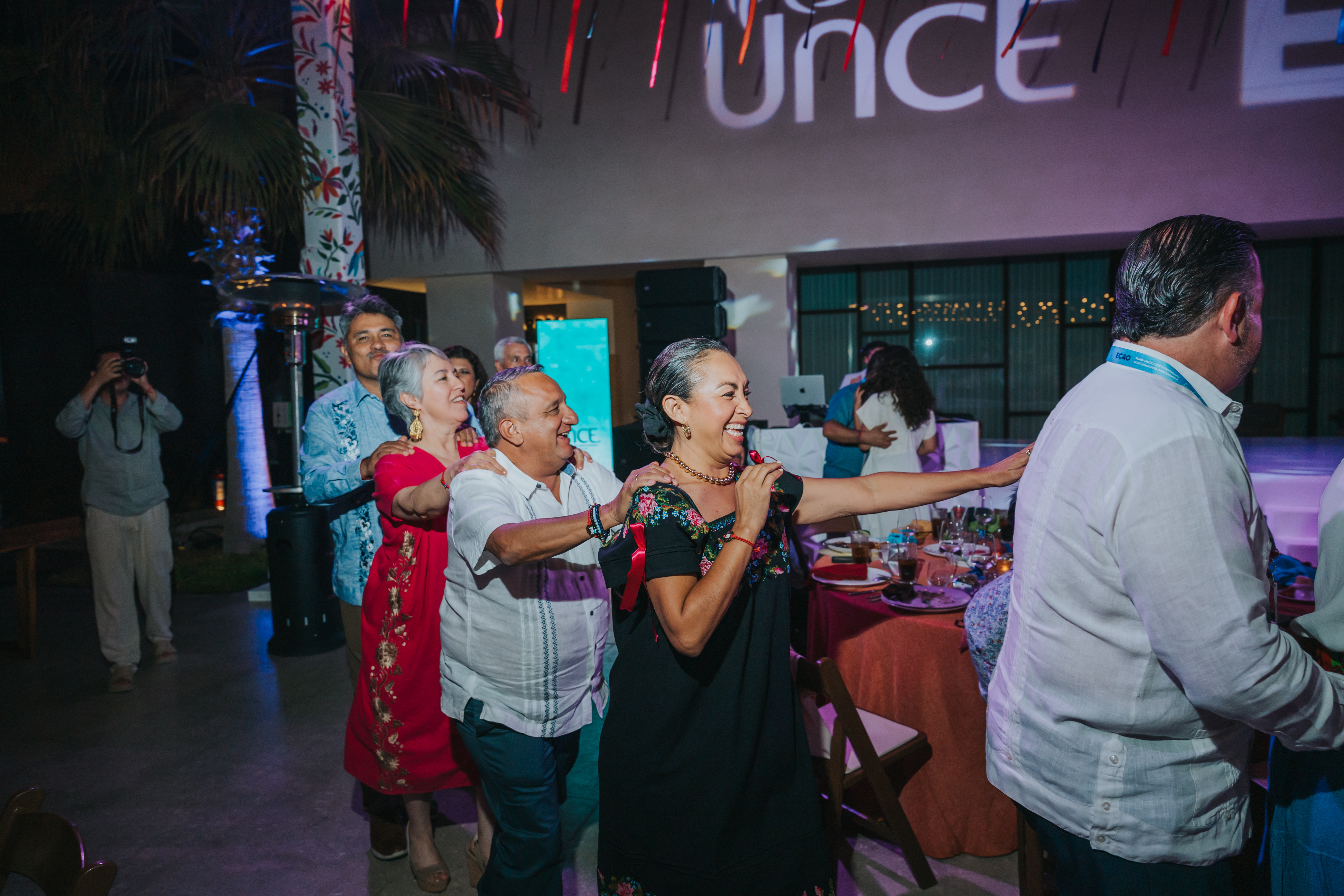 <a class='button-link' download href='https://www.ecao.org/wp-content/uploads/2026/06/ECAO-UNCE-Farewell-Evening-Cabo-05.03.26-JJStudio-187.jpg'>Download</a>