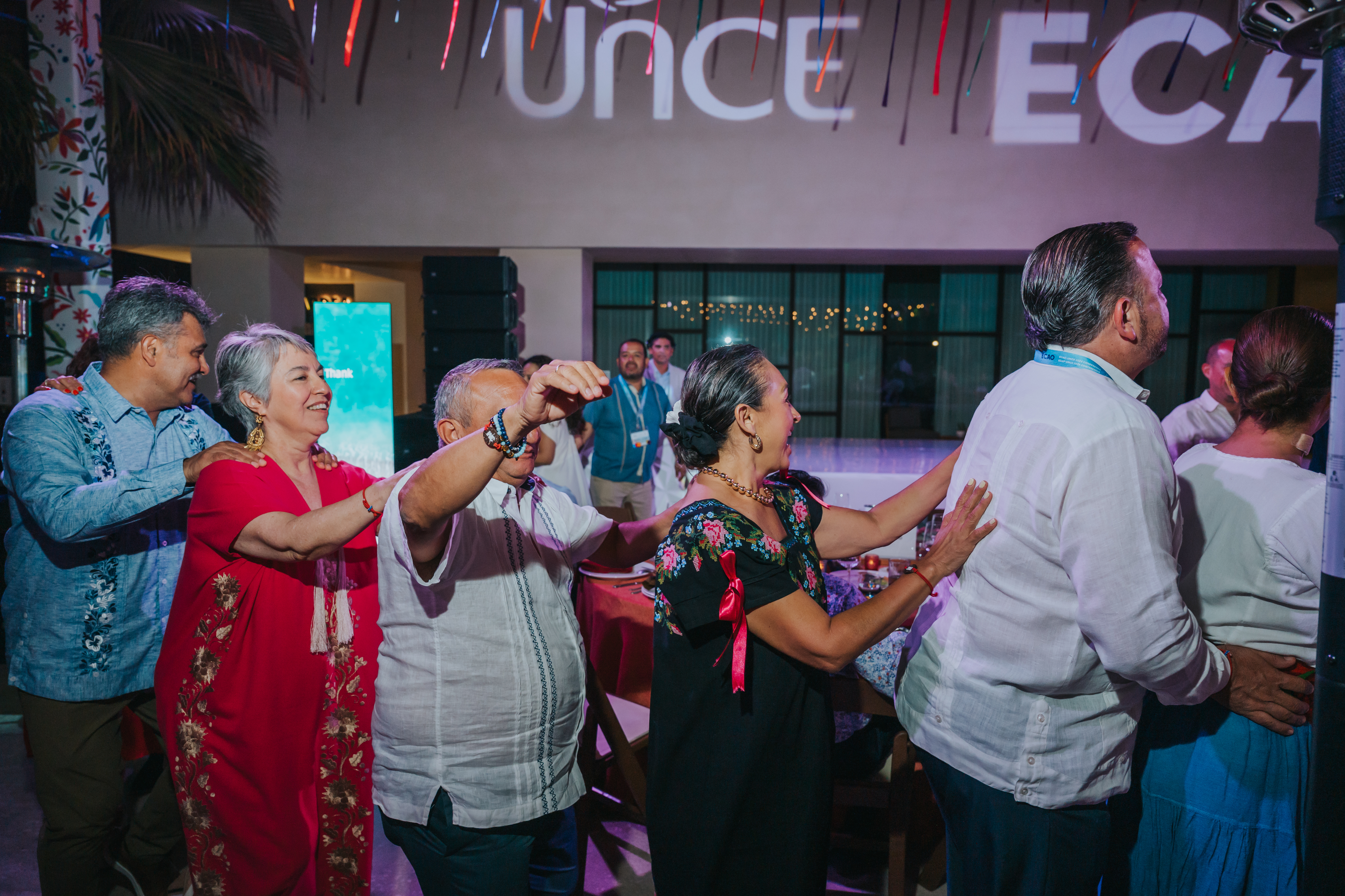 <a class='button-link' download href='https://www.ecao.org/wp-content/uploads/2026/06/ECAO-UNCE-Farewell-Evening-Cabo-05.03.26-JJStudio-188.jpg'>Download</a>