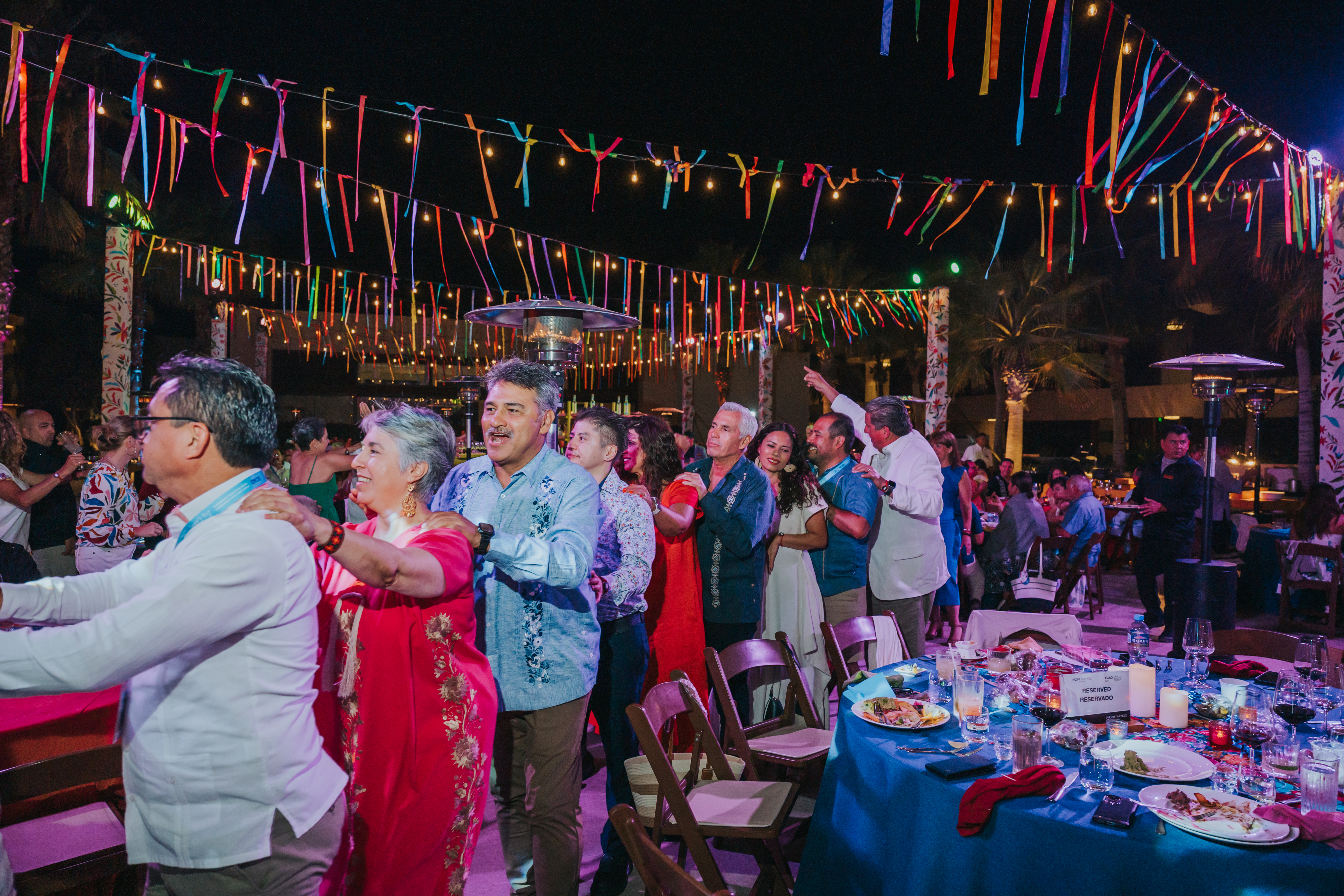 <a class='button-link' download href='https://www.ecao.org/wp-content/uploads/2026/06/ECAO-UNCE-Farewell-Evening-Cabo-05.03.26-JJStudio-192.jpg'>Download</a>