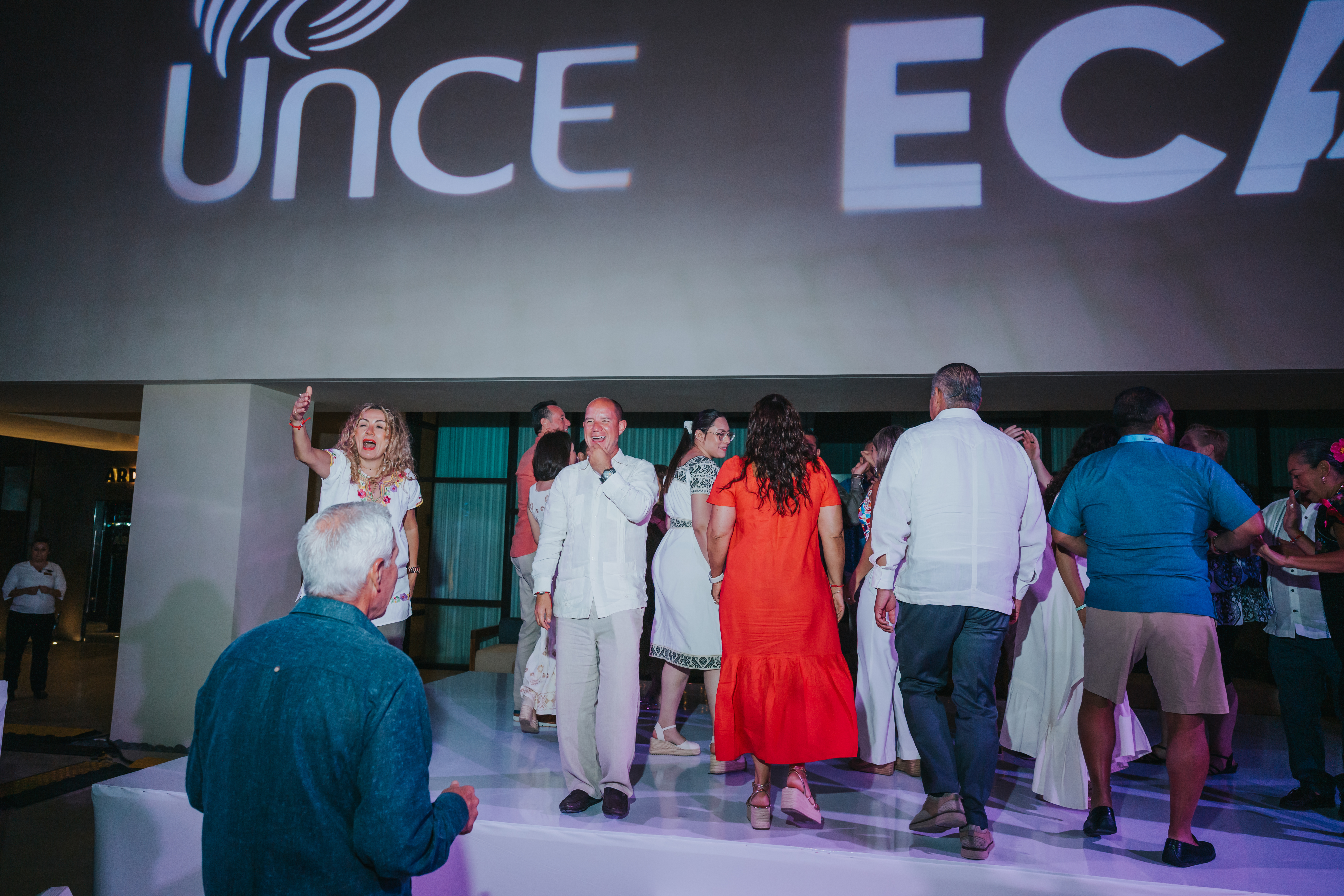 <a class='button-link' download href='https://www.ecao.org/wp-content/uploads/2026/06/ECAO-UNCE-Farewell-Evening-Cabo-05.03.26-JJStudio-233.jpg'>Download</a>