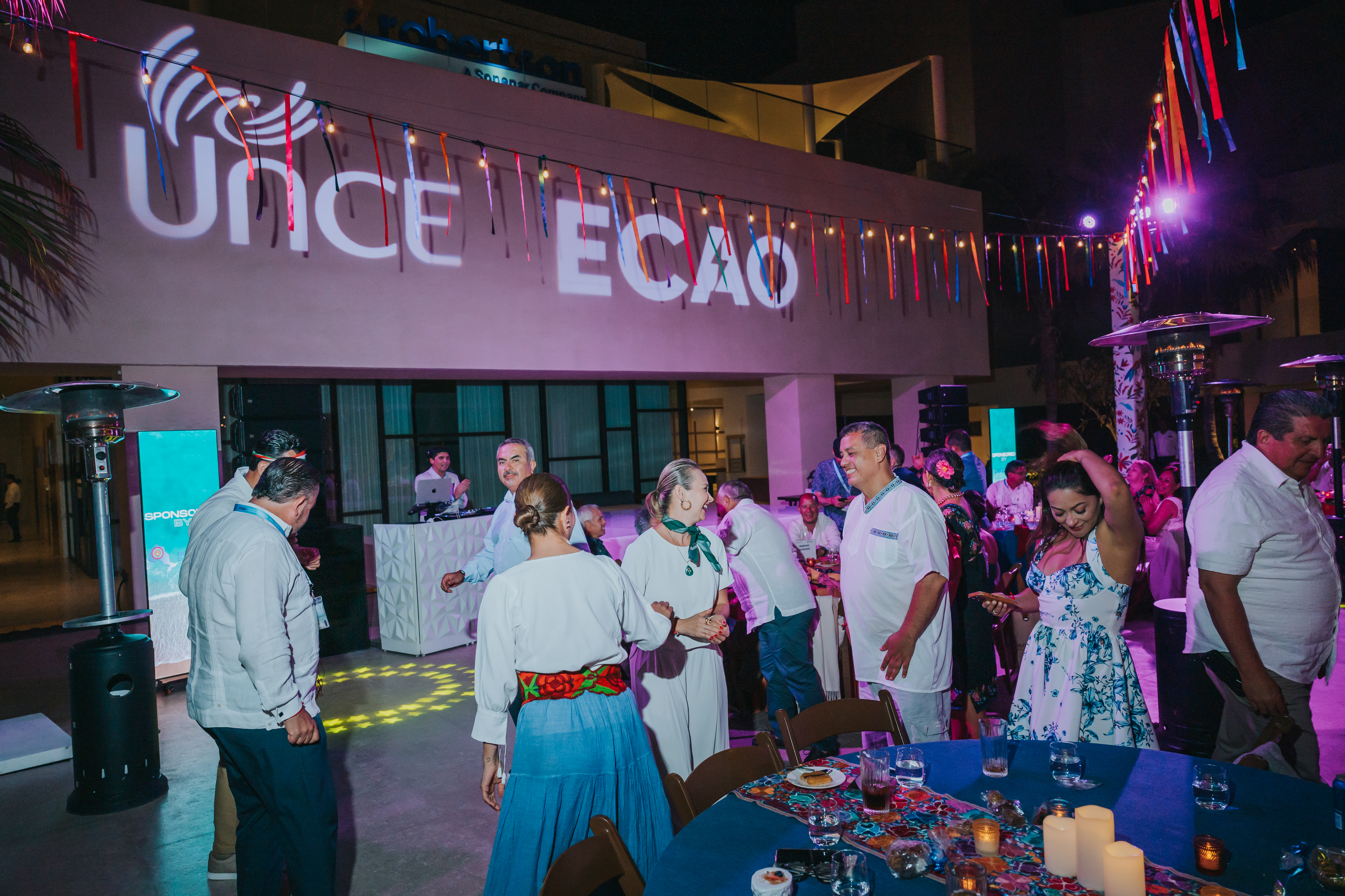 <a class='button-link' download href='https://www.ecao.org/wp-content/uploads/2026/06/ECAO-UNCE-Farewell-Evening-Cabo-05.03.26-JJStudio-259.jpg'>Download</a>