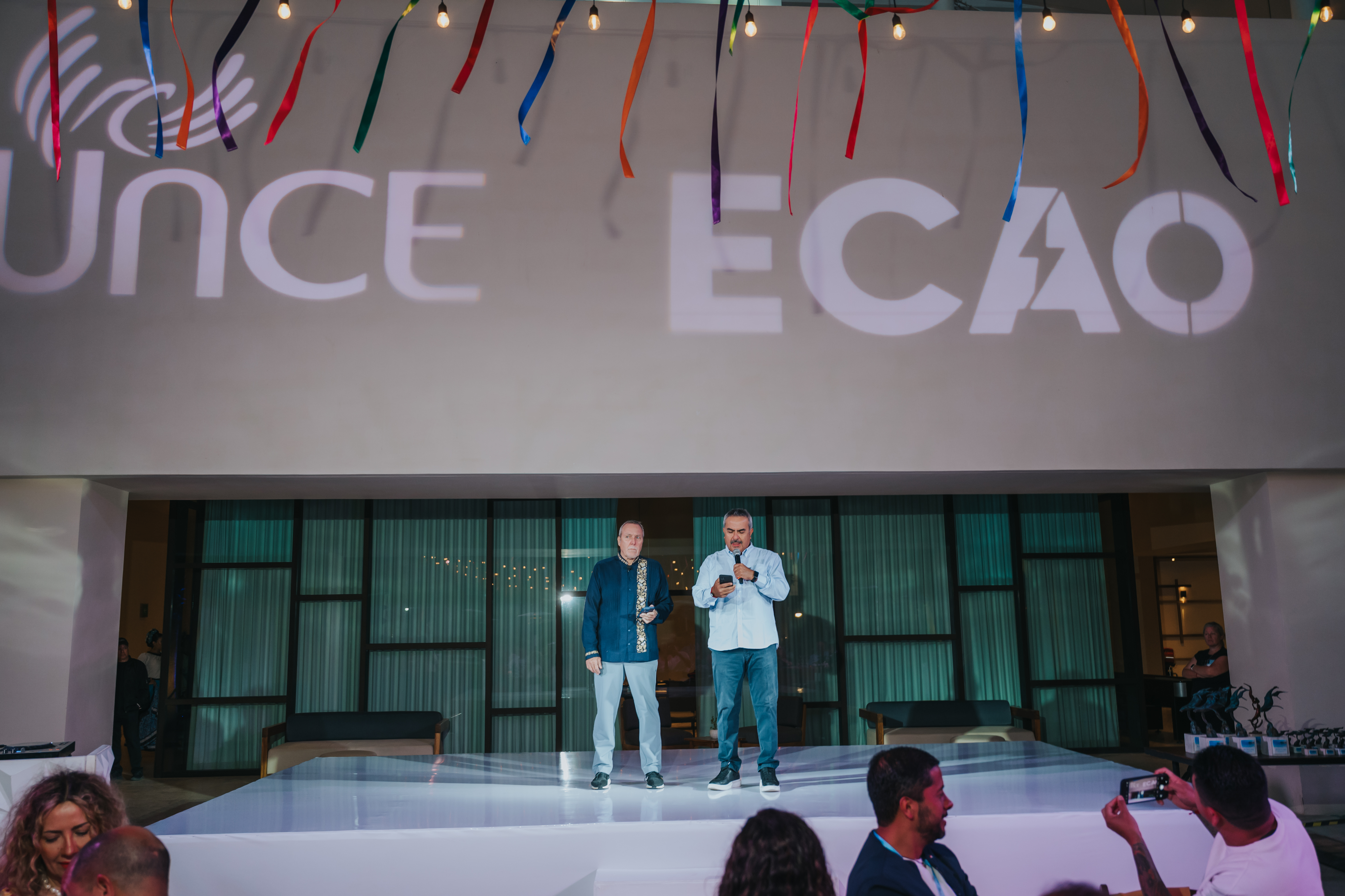 <a class='button-link' download href='https://www.ecao.org/wp-content/uploads/2026/06/ECAO-UNCE-Farewell-Evening-Cabo-05.03.26-JJStudio-83.jpg'>Download</a>