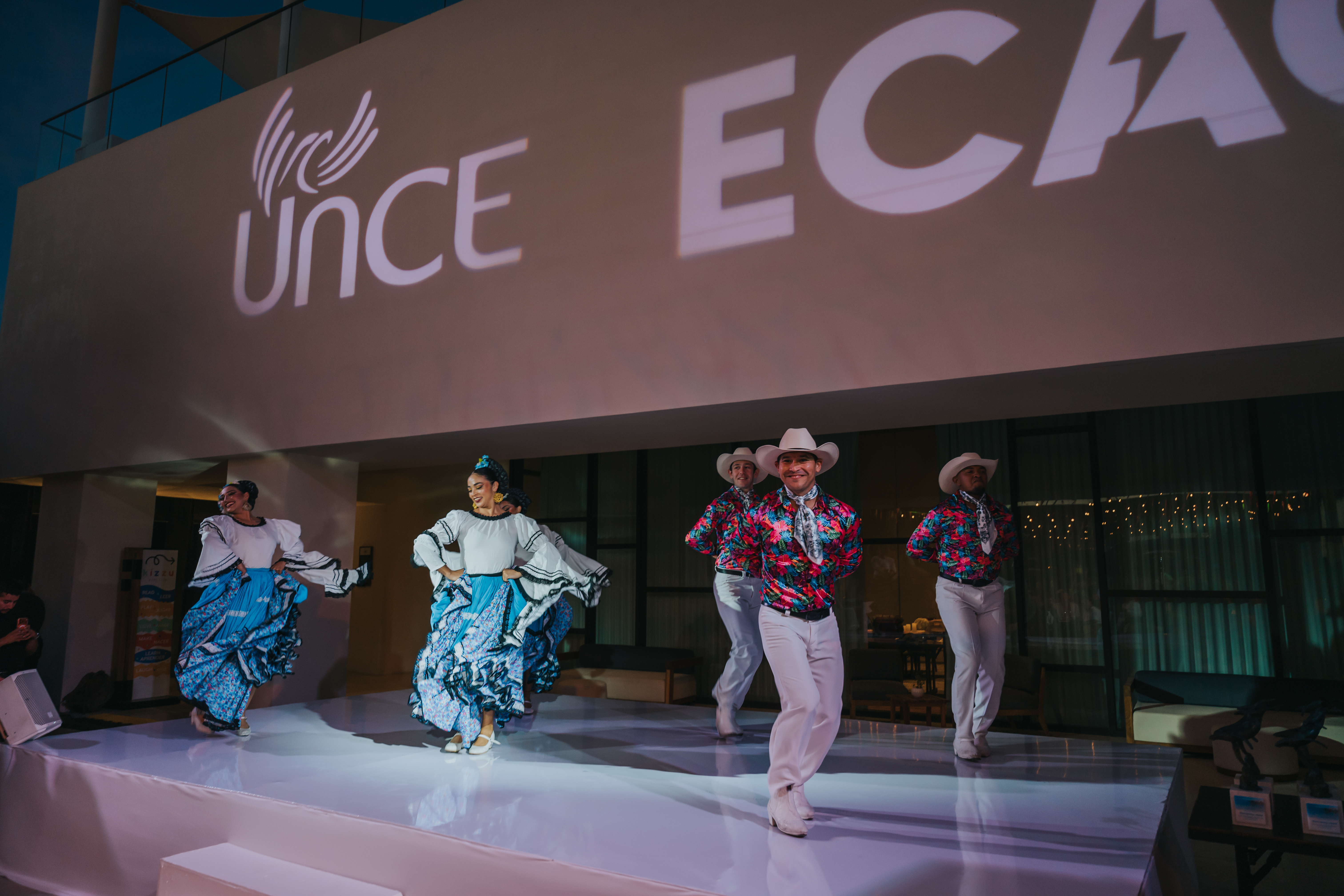 <a class='button-link' download href='https://www.ecao.org/wp-content/uploads/2026/06/ECAO-UNCE-Farewell-Evening-Cabo-05.03.26-JJStudio-94.jpg'>Download</a>